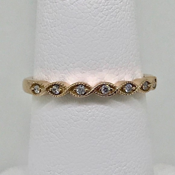 Jewelry - Diamond band in 10 kt rose gold .07 ctw